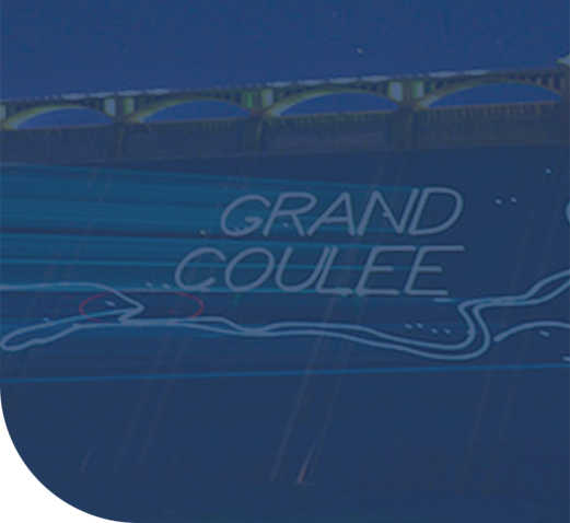 Blue graphic map with “GRAND COULEE” text and a bridge silhouette.