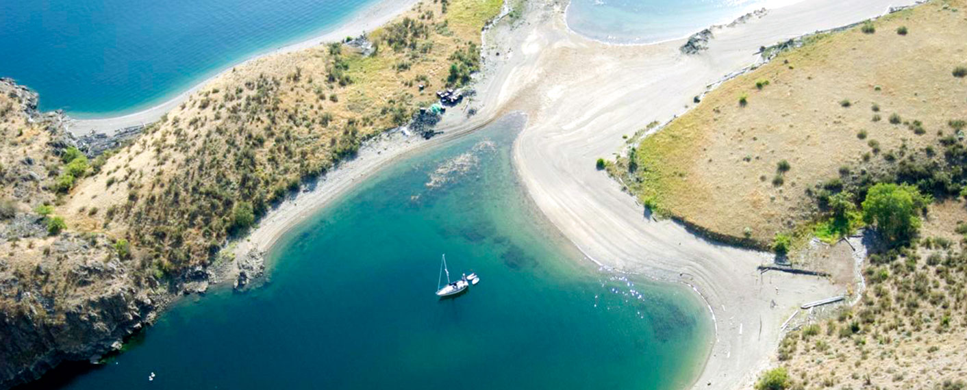 Aerial Shot of Sailboat | Marinas & Moorage | Lake Roosevelt Adventures
